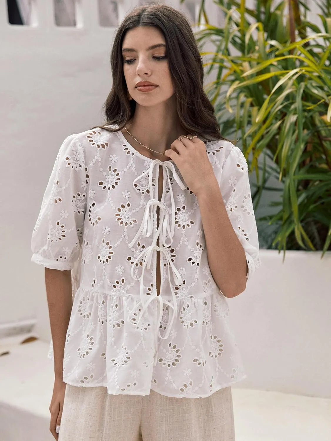 WDIRARA Women's Floral Print Bow Tie Front Blouse Puff Short Sleeve Round Neck Peplum Babydoll Shirt